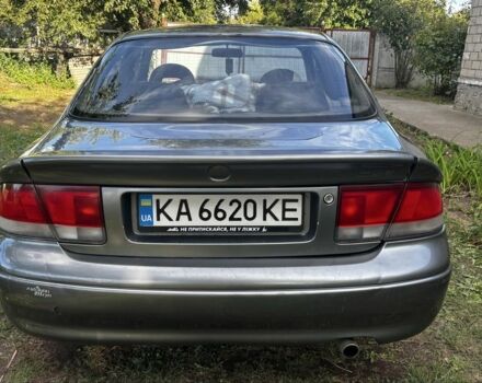 Серый Мазда 626, объемом двигателя 2 л и пробегом 340 тыс. км за 2000 $, фото 2 на Automoto.ua