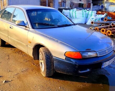 Серый Мазда 626, объемом двигателя 2 л и пробегом 300 тыс. км за 1650 $, фото 5 на Automoto.ua