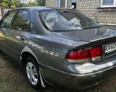 Серый Мазда 626, объемом двигателя 2 л и пробегом 340 тыс. км за 2000 $, фото 1 на Automoto.ua