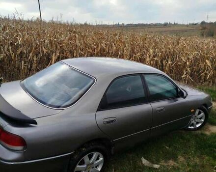 Серый Мазда 626, объемом двигателя 2 л и пробегом 320 тыс. км за 2000 $, фото 4 на Automoto.ua