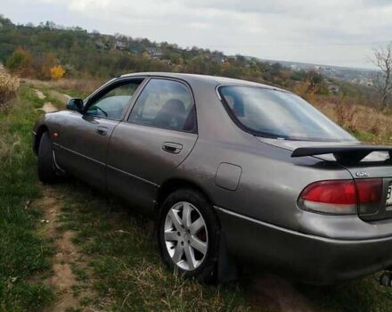 Серый Мазда 626, объемом двигателя 2 л и пробегом 320 тыс. км за 2000 $, фото 3 на Automoto.ua