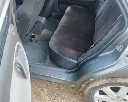 Серый Мазда 626, объемом двигателя 2 л и пробегом 320 тыс. км за 2000 $, фото 1 на Automoto.ua