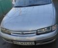 Серый Мазда 626, объемом двигателя 2 л и пробегом 200 тыс. км за 1950 $, фото 1 на Automoto.ua