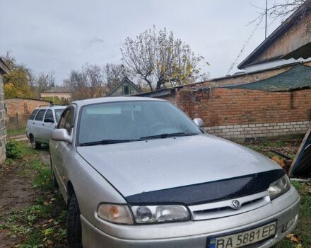 Серый Мазда 626, объемом двигателя 2 л и пробегом 422 тыс. км за 3000 $, фото 3 на Automoto.ua