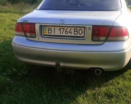 Серый Мазда 626, объемом двигателя 1.8 л и пробегом 230 тыс. км за 2500 $, фото 5 на Automoto.ua