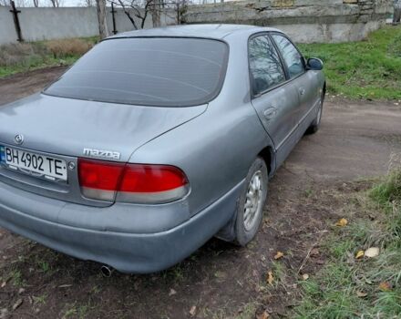 Серый Мазда 626, объемом двигателя 2 л и пробегом 297 тыс. км за 1700 $, фото 2 на Automoto.ua