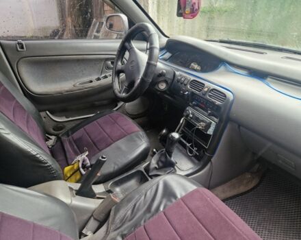 Серый Мазда 626, объемом двигателя 2 л и пробегом 422 тыс. км за 3000 $, фото 5 на Automoto.ua