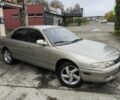 Серый Мазда 626, объемом двигателя 2 л и пробегом 400 тыс. км за 1700 $, фото 1 на Automoto.ua