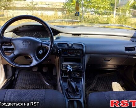 Серый Мазда 626, объемом двигателя 2 л и пробегом 297 тыс. км за 1600 $, фото 1 на Automoto.ua