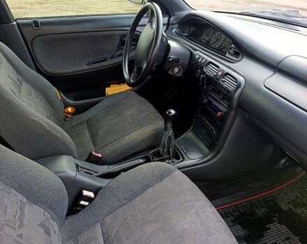 Серый Мазда 626, объемом двигателя 2 л и пробегом 250 тыс. км за 3000 $, фото 2 на Automoto.ua