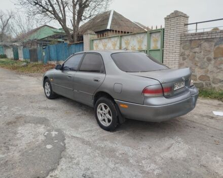 Серый Мазда 626, объемом двигателя 2 л и пробегом 100 тыс. км за 1000 $, фото 2 на Automoto.ua