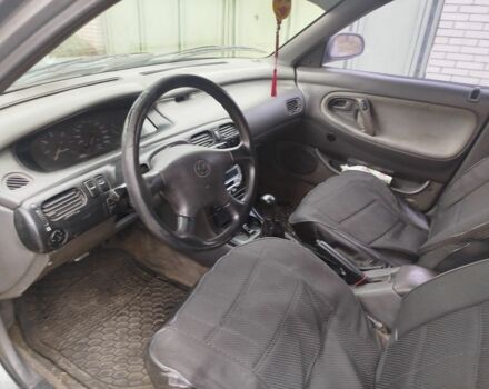 Серый Мазда 626, объемом двигателя 2 л и пробегом 100 тыс. км за 1000 $, фото 4 на Automoto.ua