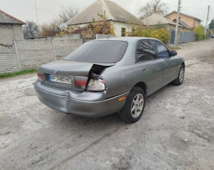 Серый Мазда 626, объемом двигателя 2 л и пробегом 100 тыс. км за 1000 $, фото 3 на Automoto.ua