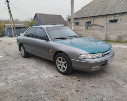 Серый Мазда 626, объемом двигателя 2 л и пробегом 100 тыс. км за 1000 $, фото 1 на Automoto.ua