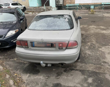 Серый Мазда 626, объемом двигателя 2 л и пробегом 348 тыс. км за 2200 $, фото 2 на Automoto.ua