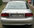 Серый Мазда 626, объемом двигателя 2 л и пробегом 246 тыс. км за 1800 $, фото 2 на Automoto.ua