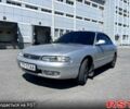Серый Мазда 626, объемом двигателя 2 л и пробегом 284 тыс. км за 2500 $, фото 1 на Automoto.ua