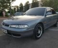 Серый Мазда 626, объемом двигателя 2 л и пробегом 450 тыс. км за 700 $, фото 1 на Automoto.ua