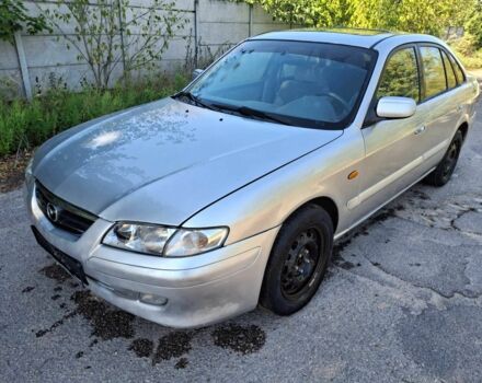 Серый Мазда 626, объемом двигателя 2 л и пробегом 310 тыс. км за 752 $, фото 2 на Automoto.ua