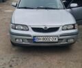 Серый Мазда 626, объемом двигателя 1.8 л и пробегом 337 тыс. км за 2200 $, фото 1 на Automoto.ua