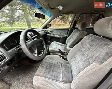 Серый Мазда 626, объемом двигателя 1.8 л и пробегом 340 тыс. км за 2200 $, фото 7 на Automoto.ua