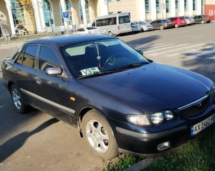 Серый Мазда 626, объемом двигателя 2 л и пробегом 303 тыс. км за 3100 $, фото 3 на Automoto.ua