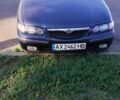 Серый Мазда 626, объемом двигателя 2 л и пробегом 303 тыс. км за 3100 $, фото 1 на Automoto.ua
