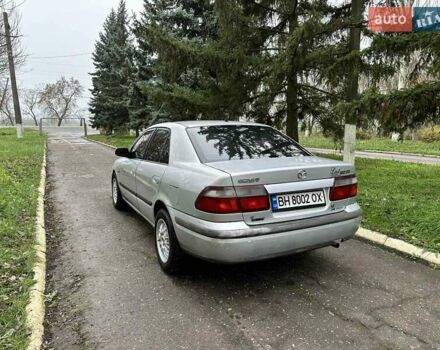 Серый Мазда 626, объемом двигателя 1.8 л и пробегом 340 тыс. км за 2200 $, фото 1 на Automoto.ua