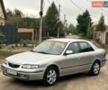 Серый Мазда 626, объемом двигателя 2 л и пробегом 255 тыс. км за 2900 $, фото 1 на Automoto.ua