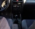 Серый Мазда 626, объемом двигателя 2 л и пробегом 303 тыс. км за 3100 $, фото 1 на Automoto.ua