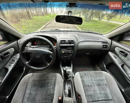 Серый Мазда 626, объемом двигателя 1.8 л и пробегом 340 тыс. км за 2200 $, фото 8 на Automoto.ua