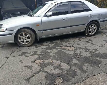 Серый Мазда 626, объемом двигателя 2 л и пробегом 320 тыс. км за 2630 $, фото 1 на Automoto.ua