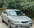 Серый Мазда 626, объемом двигателя 2 л и пробегом 380 тыс. км за 1750 $, фото 1 на Automoto.ua
