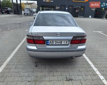 Серый Мазда 626, объемом двигателя 2 л и пробегом 319 тыс. км за 3200 $, фото 6 на Automoto.ua