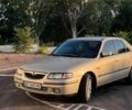 Серый Мазда 626, объемом двигателя 2 л и пробегом 305 тыс. км за 4900 $, фото 1 на Automoto.ua