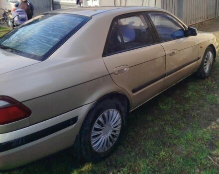 Серый Мазда 626, объемом двигателя 2 л и пробегом 2 тыс. км за 1500 $, фото 1 на Automoto.ua