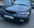 Сірий Мазда 626, об'ємом двигуна 2 л та пробігом 200 тис. км за 1399 $, фото 1 на Automoto.ua