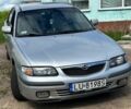 Серый Мазда 626, объемом двигателя 2 л и пробегом 300 тыс. км за 445 $, фото 1 на Automoto.ua