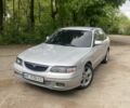 Серый Мазда 626, объемом двигателя 2 л и пробегом 360 тыс. км за 2700 $, фото 1 на Automoto.ua
