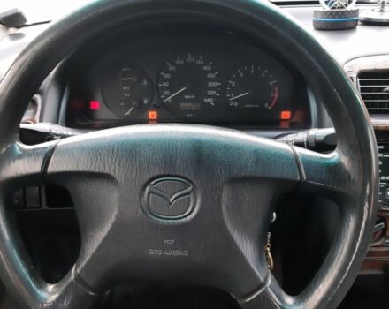 Серый Мазда 626, объемом двигателя 1.8 л и пробегом 225 тыс. км за 1200 $, фото 7 на Automoto.ua
