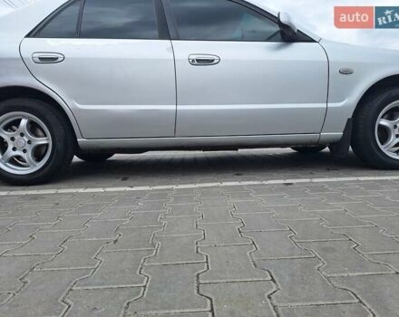 Серый Мазда 626, объемом двигателя 2 л и пробегом 319 тыс. км за 3200 $, фото 27 на Automoto.ua