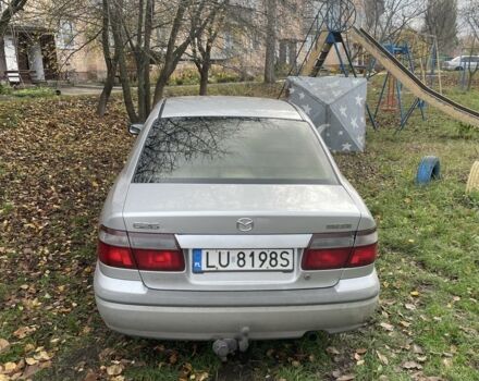 Серый Мазда 626, объемом двигателя 2 л и пробегом 330 тыс. км за 1000 $, фото 4 на Automoto.ua