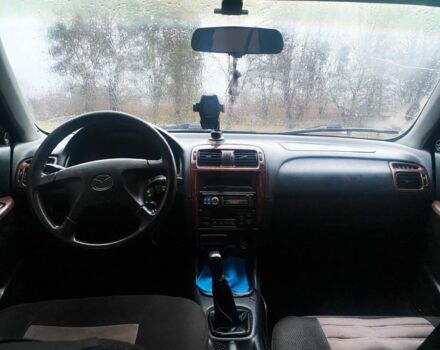 Сірий Мазда 626, об'ємом двигуна 2 л та пробігом 420 тис. км за 2500 $, фото 5 на Automoto.ua