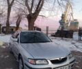 Серый Мазда 626, объемом двигателя 2 л и пробегом 318 тыс. км за 3300 $, фото 1 на Automoto.ua