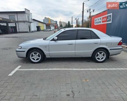 Серый Мазда 626, объемом двигателя 2 л и пробегом 319 тыс. км за 3200 $, фото 3 на Automoto.ua