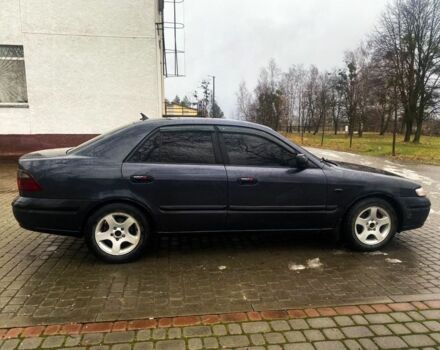 Сірий Мазда 626, об'ємом двигуна 2 л та пробігом 420 тис. км за 2500 $, фото 3 на Automoto.ua