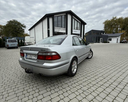 Сірий Мазда 626, об'ємом двигуна 1.8 л та пробігом 276 тис. км за 2000 $, фото 3 на Automoto.ua