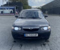 Серый Мазда 626, объемом двигателя 2 л и пробегом 304 тыс. км за 3500 $, фото 1 на Automoto.ua