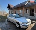 Серый Мазда 626, объемом двигателя 2 л и пробегом 300 тыс. км за 1000 $, фото 1 на Automoto.ua