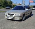 Серый Мазда 626, объемом двигателя 2 л и пробегом 350 тыс. км за 3300 $, фото 1 на Automoto.ua